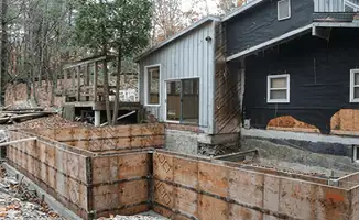 Prepared site with foundation forms for home remodeling and addition project in Dallas, TX